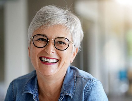 Woman showing off her complete smile