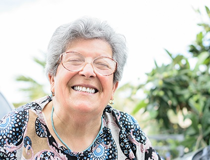 Woman smiling outside