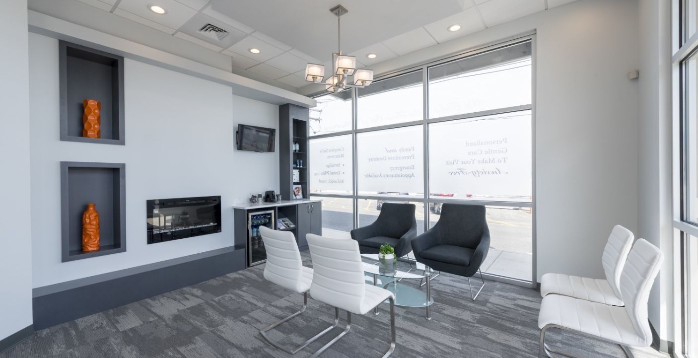 Welcoming reception area of dental office in Peabody