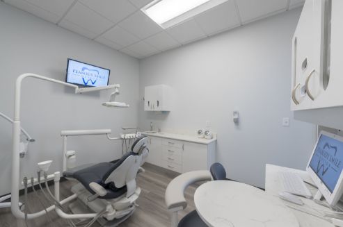 Dental treatment room with soothing white walls